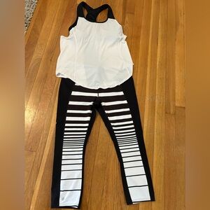 Athleta Black and White Striped Sonar Leggings and Matching Support Top.